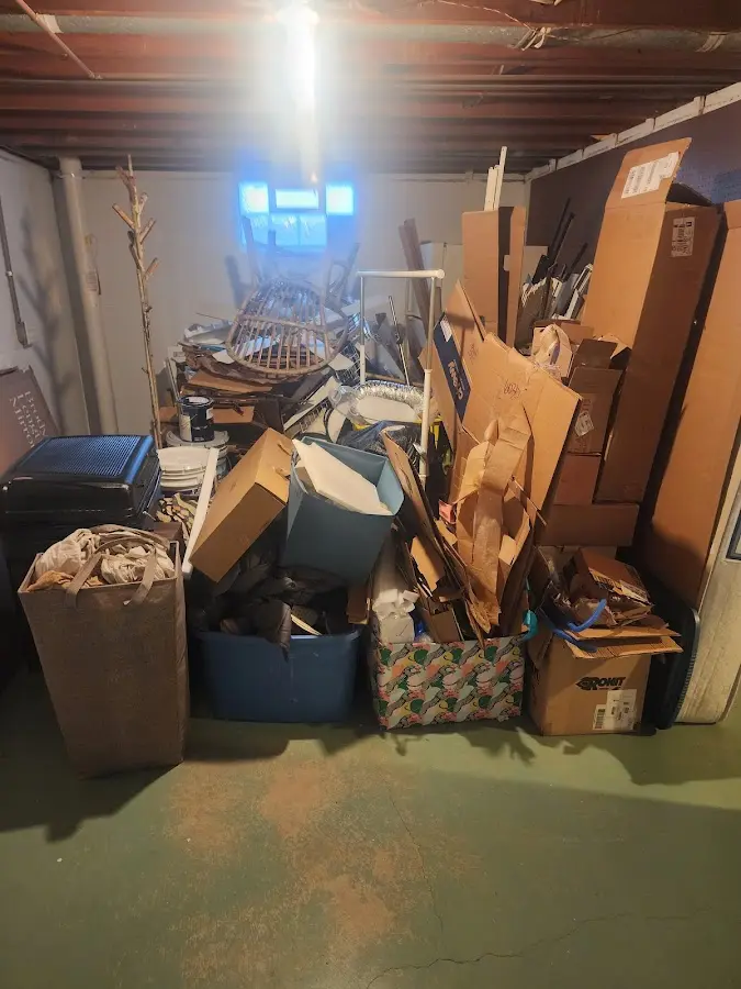 Roll-off dumpster container at job site for 2 Yard Dumpster Rental in Frostproof